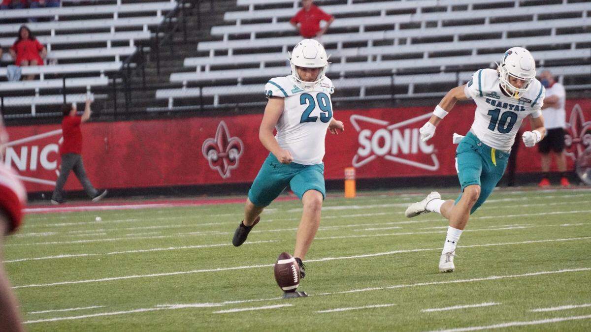 Coastal Carolina junior kicker Massimo Biscardi kicks off against No. 21 Louisiana on Wednesday night in CCU’s 30-27 win at Cajun Field in Lafayette, La. Biscardi kicked the game-winning 40-yard field goal with 4 seconds to play. Coastal football improved to 4-0 overall and 2-0 in the Sun Belt Conference. Oct. 14, 2020