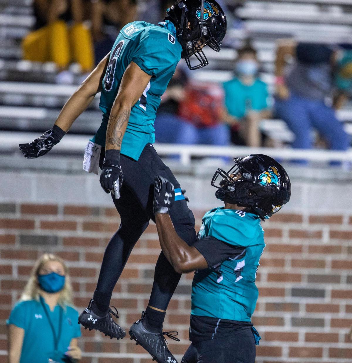 Coastal’s Jaivon Heiligh celebrates in the end zone after catching a touchdown pass. Coastal Carolina hosted Campbell during it’s 2020 home-opening football game at Brooks Stadium in Conway, SC. on Friday night. September 18, 2020.