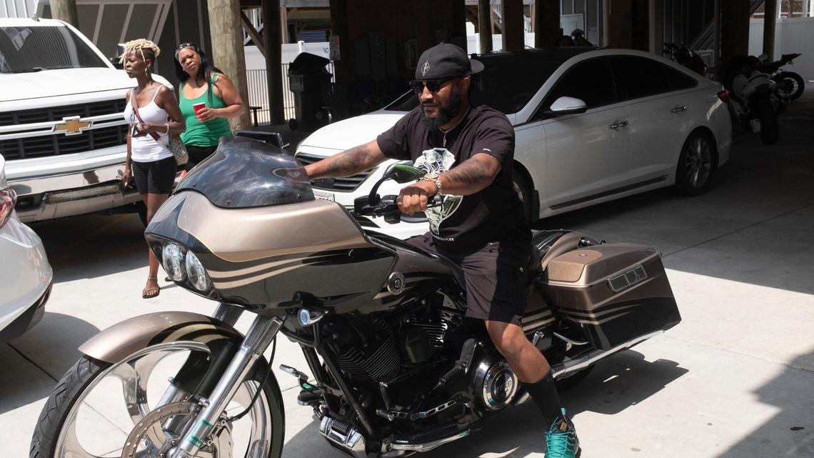 Members of the Black Dragon Kings motorcycle club ride out from a beach house in North Myrtle Beach on Thursday. Small groups of bikers have arrived on the North end of the Grand Strand for Memorial Day weekend despite Atlantic Beach canceling it’s annual motorcycle festival for the second year due to COVID-19. May 27, 2021.