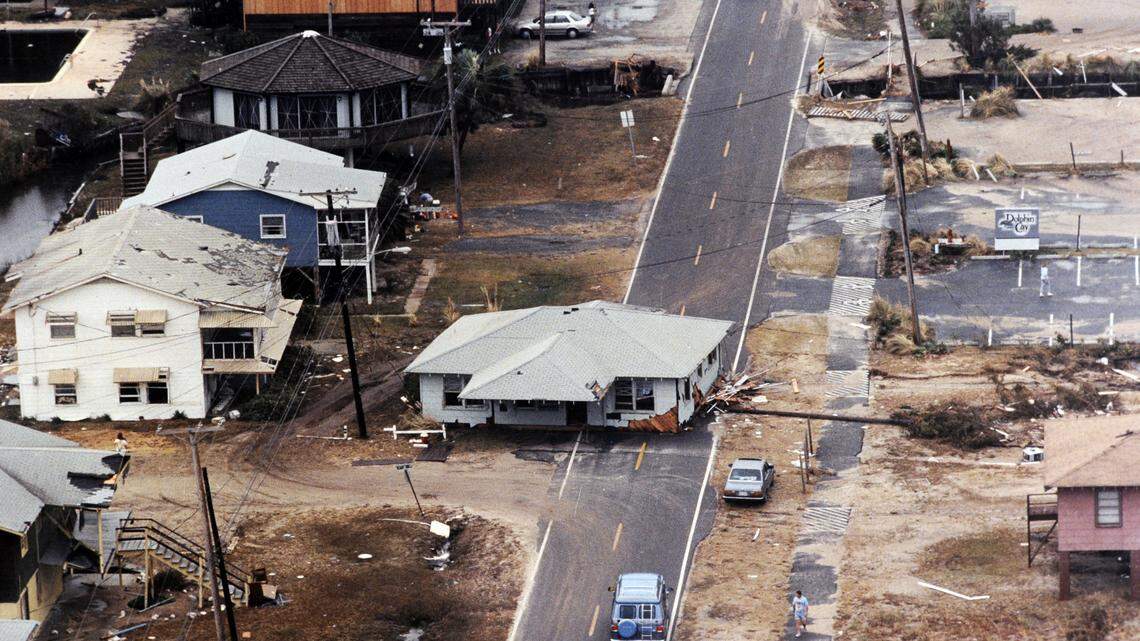 Hugo’s storm surge swept this Surfside Beach home from its oceanfront lot into the middle of the Ocean Boulevard. The random cruelty of Hurricane Hugo was evident as some oceanfront homes were flattened while neighboring house were left intact.