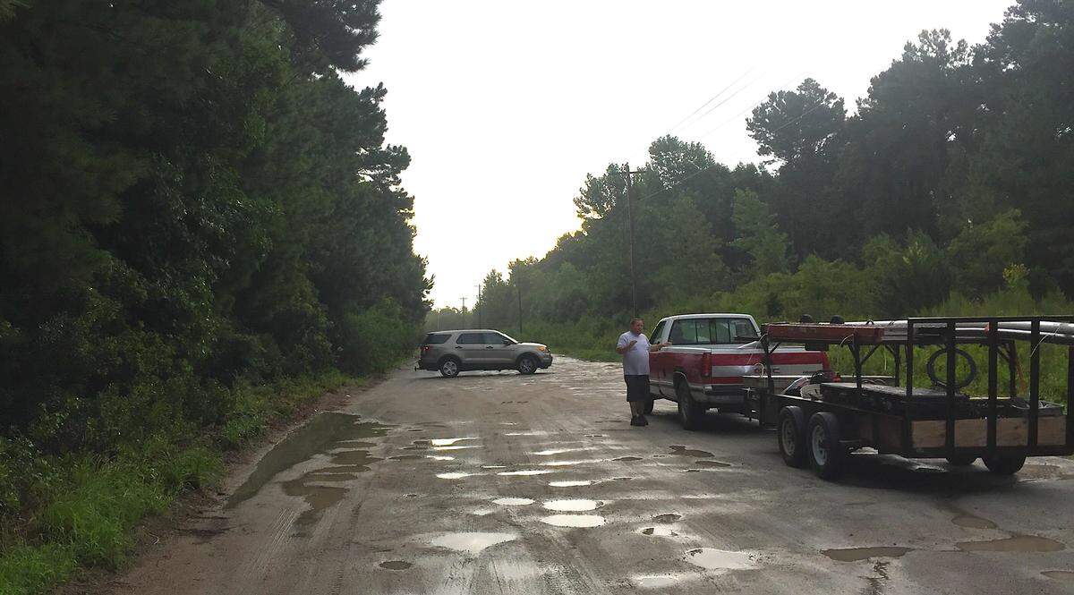 Local law enforcement have Frontage Road blocked off between SC 31 and the Intracoastal Waterway as they continue to search for a suspect from a traffic stop.