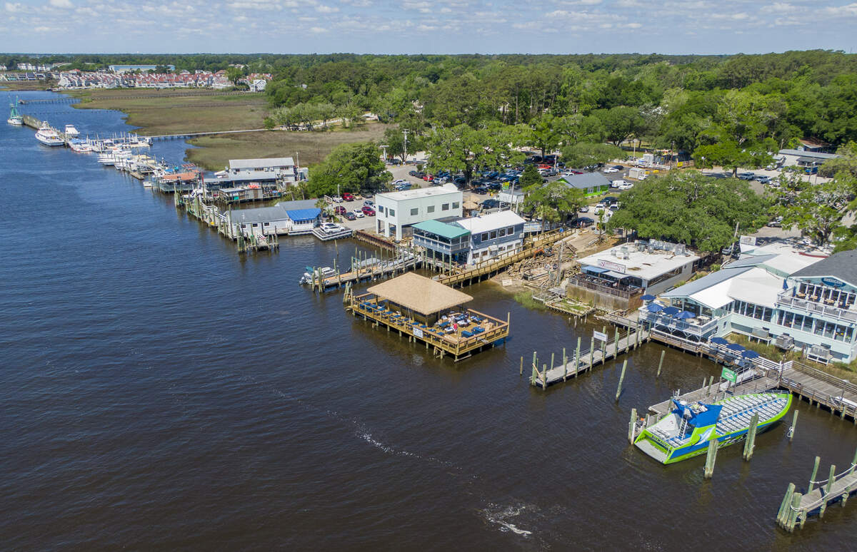 Mako’s Marina Bar N Grill in Little River, expanded with a new tiki bar and marina. It was made possible by a recent change in South Carolina law allowing food and drink service over water, and is part of a broader effort to make Little River a destination.