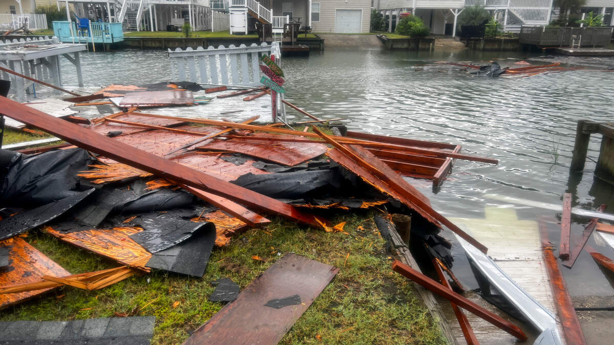Portions of a roof lay scattered in the canals of Hog Inlet in North Myrtle Beach S.C. after a tornado damaged roofs near 56th Avenue North in North Myrtle Beach, S.C. Hurricane Idalia was downgraded to a tropical storm after hitting the gulf coast of Florida on Wednesday but brought heavy rains, coastal flooding and tornados to the South Carolina coastline. Aug. 31, 2023.
