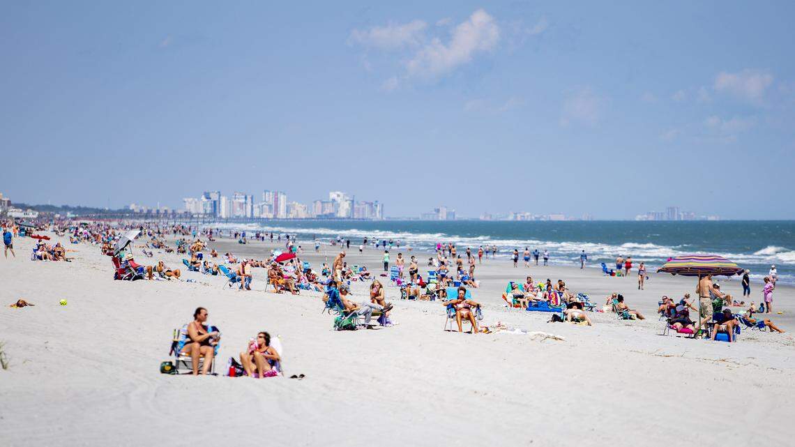 ‘It’s like Christmas’: Residents flee to the beach as access re-opens amid coronavirus