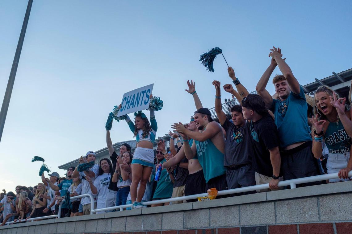 Students cheer the start of the Coastal Carolina University 2021-22 season. Aug. 11, 2021.
