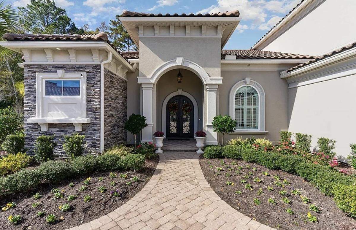 A home in the gated Grand Dunes community in Myrtle Beach is listed for $1.7 million on Zillow. It has four bedrooms and a three-car garage.