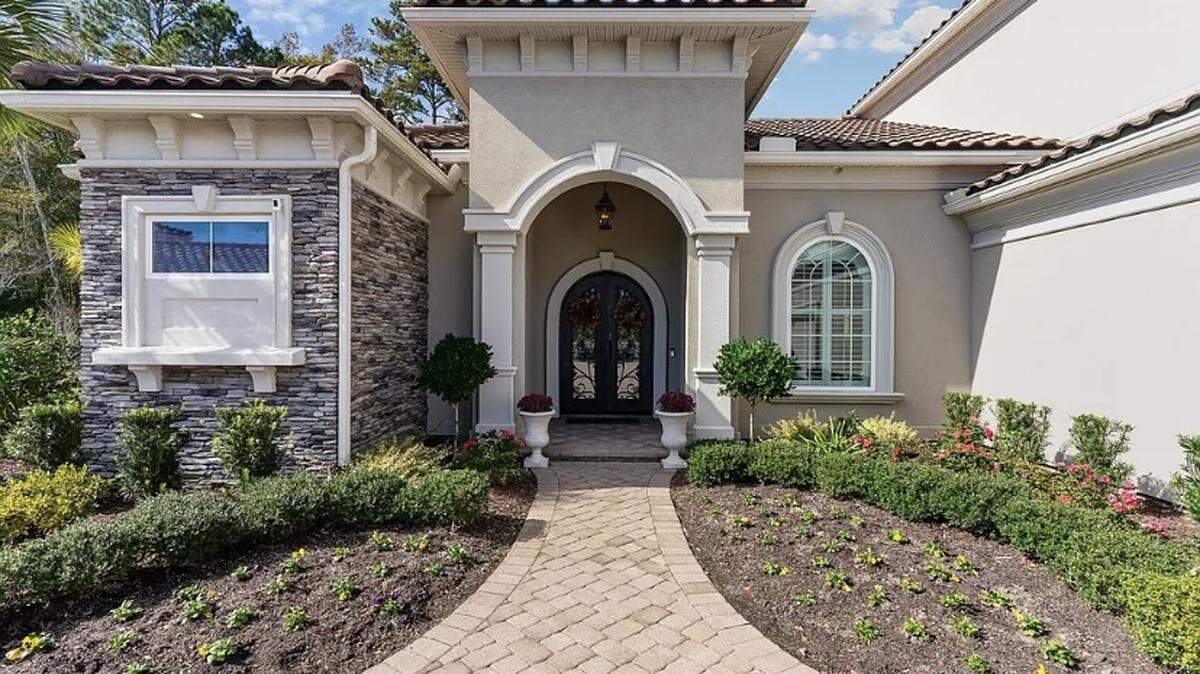 A home in the gated Grand Dunes community in Myrtle Beach is listed for $1.7 million on Zillow. It has four bedrooms and a three-car garage.