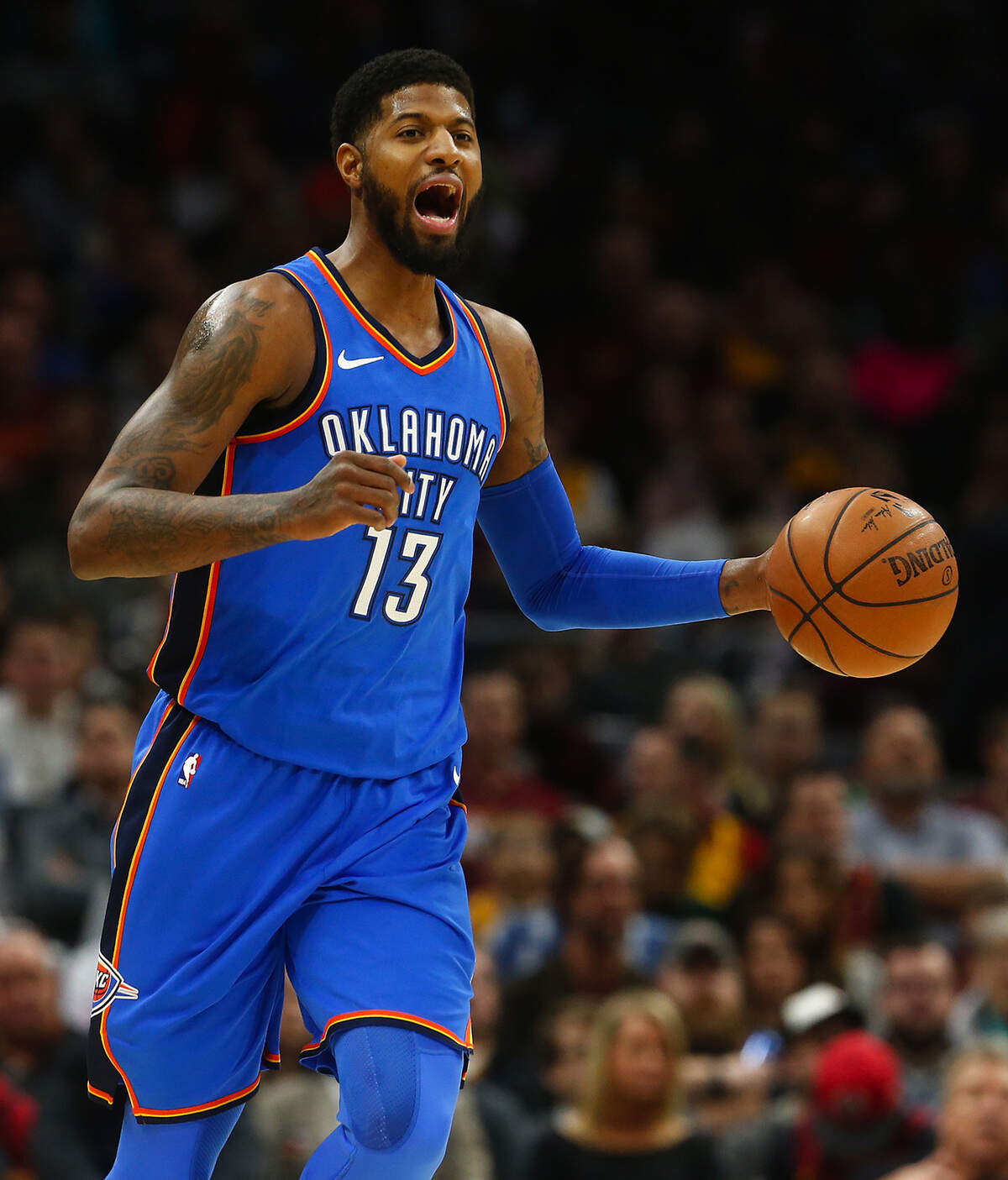The Oklahoma City Thunder’s Paul George in transition against the Cleveland Cavaliers in the first quarter on Saturday, Jan. 20, 2018, at Quicken Loans Arena in Cleveland, Ohio. (Leah Klafczynski/Akron Beacon Journal/TNS)