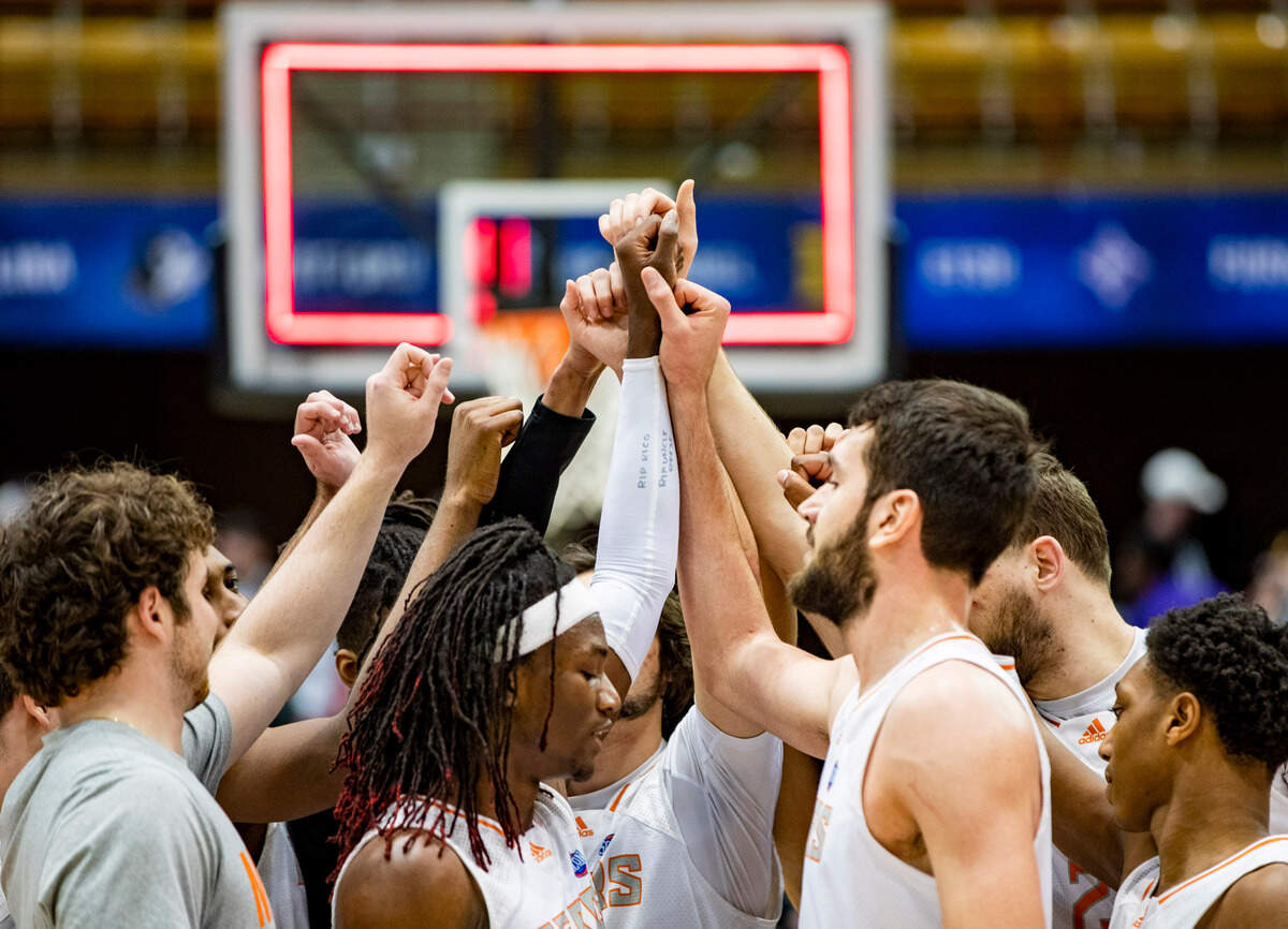Mercer celebrates after defeating Western Carolina 81-53 Friday night in the SoCon Ingles Basketball Championships at the Harrah’s Cherokee Center in Asheville, N.C.