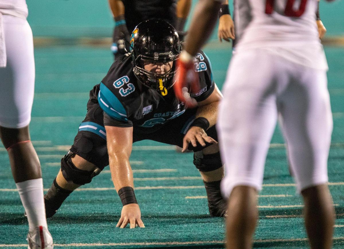 Coastal’s Trey Carter sets up on the offensive line against South Alabama. Coastal Carolina, ranked No. 15 in this week’s AP Top 25 Poll, played South Alabama on Saturday night in a Sun Belt Conference football game at Brooks Stadium in Conway. November 7, 2020.