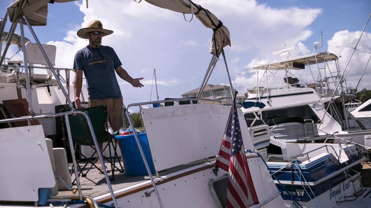 Dylan Goodwin was still debating whether to stay on his boat “Summer Memories” at the Doc Holliday Marina on Wednesday afternoon prior to Hurricane Florence’s arrival on Wednesday, September 10, 2018.