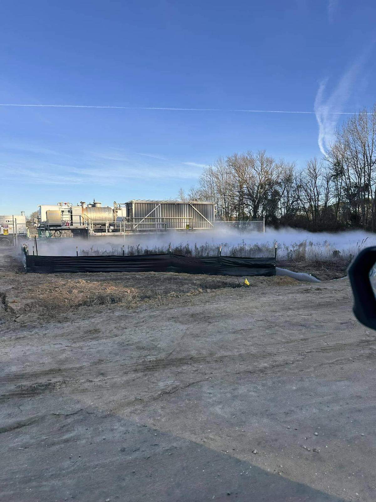 A thick layer of fog covers Water Tower Road. The phenomenon happened near a natural gas substation and is due to the recent cold temperatures along the Grand Strand.