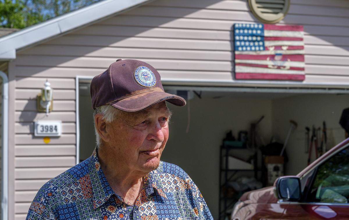 Fred Portway, an 88-year-old retiree stands in front of his garage reminiscing about his life before and since the cornavirus pandemic. “We’ve gone through fires, and tsunamis and earthquakes, and 9/11, World War 2, World War 1., those were in isolated areas, this is worldwide and we’re into something that is an unknown,” he said. April 8, 2020