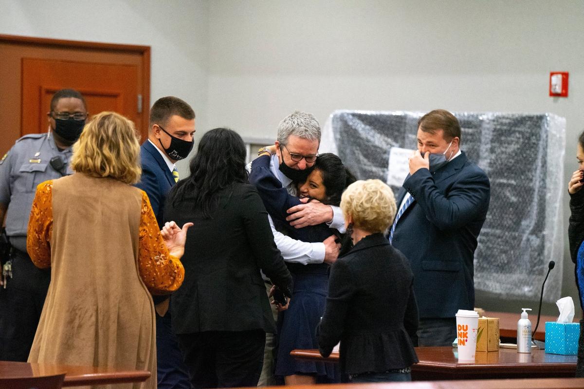 Gary Bennett hugs members of his legal team after he was found not guilty of murder. Bennett was convicted in 2003, but was granted a retrial on the charges.