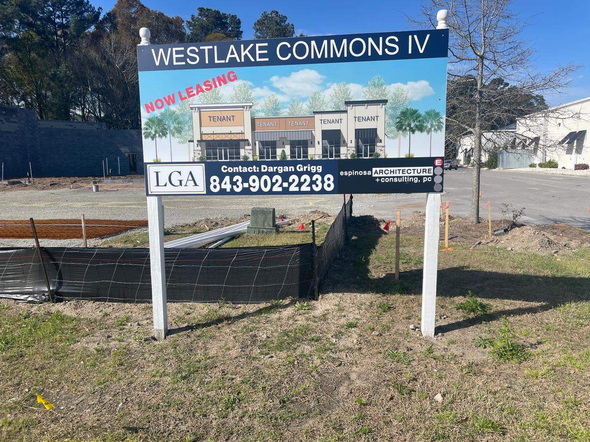 A billboard announcing what Westlake Commons IV in Carolina Forest, SC will look like upon completion.
