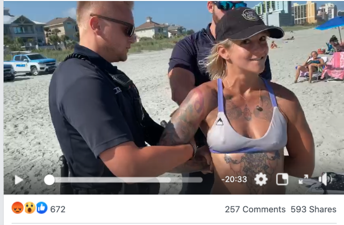 Sam Panda shared a video to Facebook showing her being detained at Myrtle Beach for wearing a thong bikini.