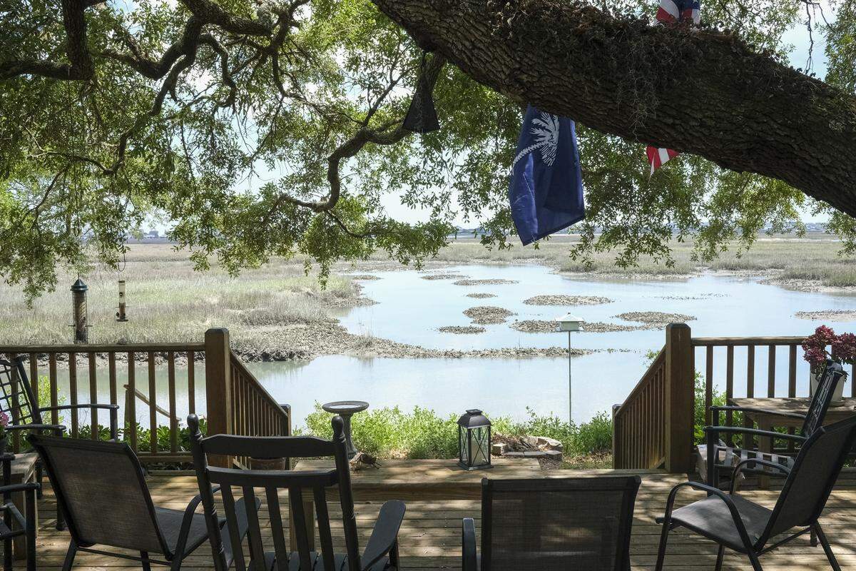 A view of the Murrells Inlet Marsh from Tom Hora’s mother’s former home on May 22, 2026. During low tide in Murrells Inlet, much of the area’s shallow estuary is exposed.  Estuaries are among the most biologically productive ecosystems and serve as vital nurseries where many marine species begin their lives.