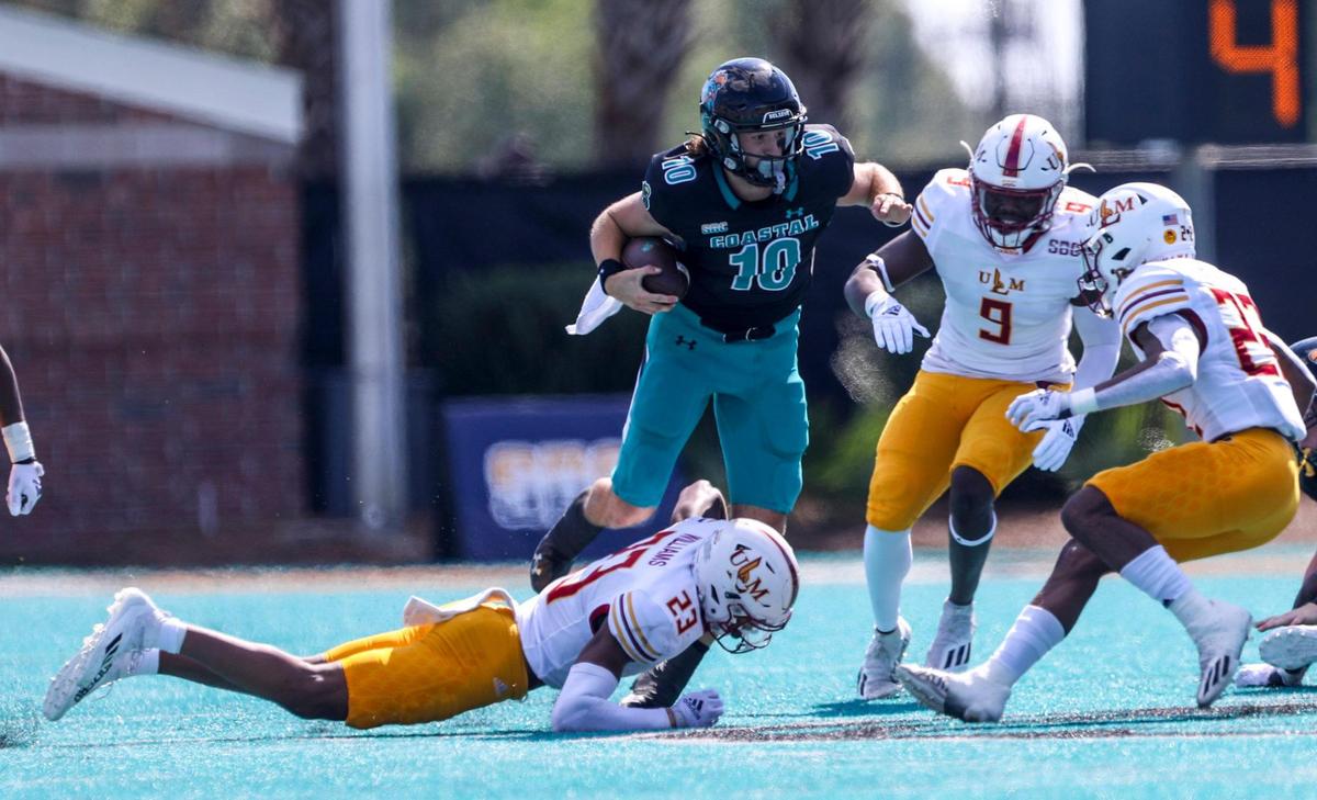Coastal’s Grayson McCall with a quarterback sneak in the first quarter on Saturday. The No. 16 Coastal Carolina University Chanticleers college football team defeated Louisiana-Monroe Warhawks Saturday at Brooks Stadium in Conway, SC. Oct. 2, 2021.