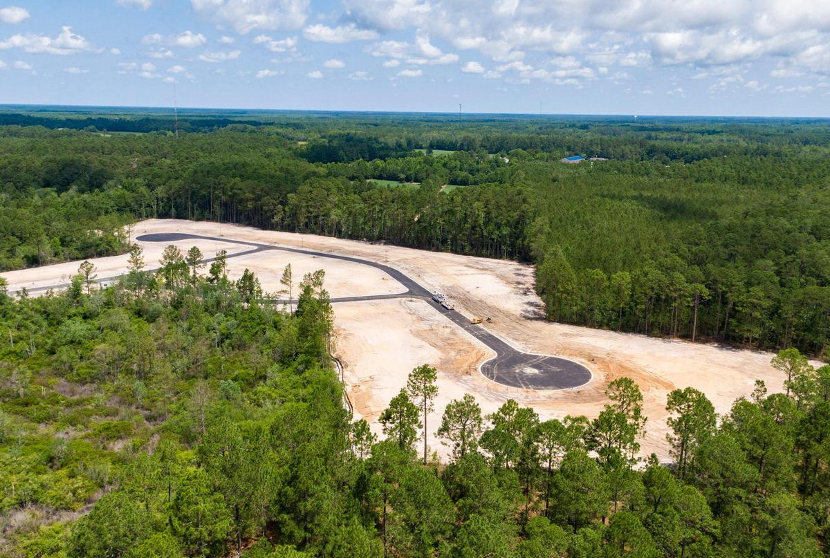 Crews work to develop land in the Park Pointe neighborhood adjacent to the North Myrtle Beach Park & Sports complex in North Myrtle Beach.