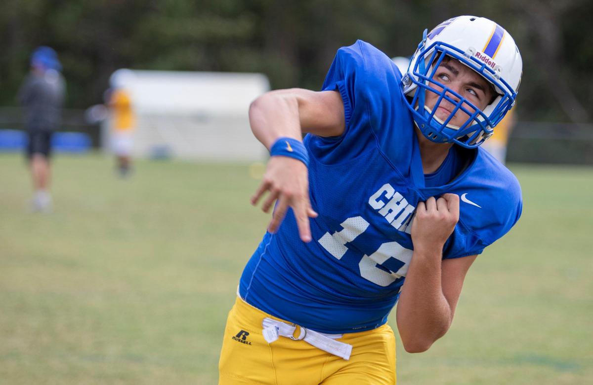 North Myrtle Beach Chiefs sophomore quarterback Cam Freeman throws a pass during practice Tuesday afternoon in Little River.