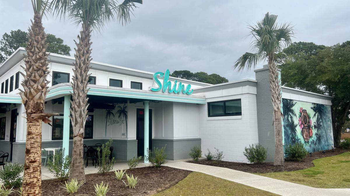 1229 Shine in Market Common is looking to add a pair of food trucks and art installation at its location.