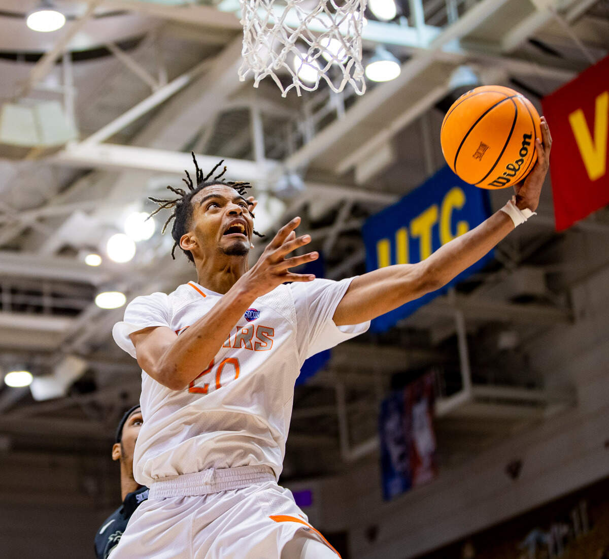 Mercer graduate student guard Jalen Watson drives to the net against West Carolina junior forward Marlow Gilmore Friday night during the SoCOn Ingle Basketball Championships at the Harrah’s Cherokee Center in Asheville, N.C.