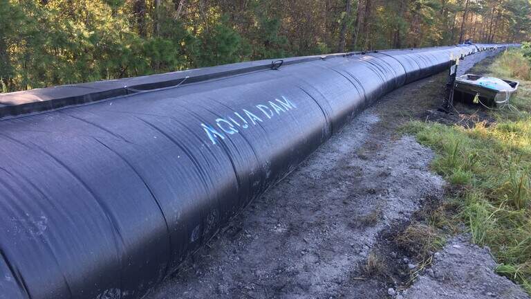 How will an inflatable dam protect your drinking water during the coming floods?