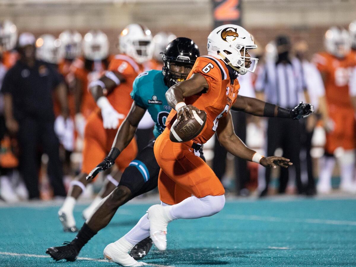 Coastal’s Tarron Jackson stalks Campbells Hajj-Malik Williams. Coastal Carolina University football hosted Campbell during it’s 2020 home-opening game at Brooks Stadium in Conway, SC. on Friday night. September 18, 2020.