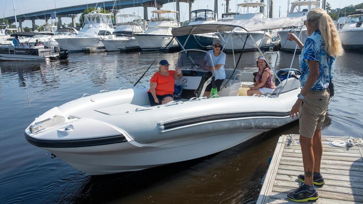 Members of Freedom Boat club load up at Harbourgate marina for a day on the water in North Myrtle Beach. The boat club, which maintains a fleet of vessels in three Myrtle Beach area locations, has experienced record membership growth due in part to low dealer inventories and post-pandemic interest in boating. Aug. 3, 2022.
