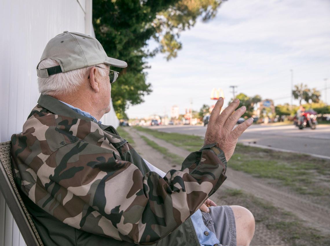 Arthur Weygant sits in a lawn chair waving at bikers as they pass into Murrells Inlet. “I used to be a biker,” the U.S. Marine veteran says, “but as I got older, I stopped taking chances.” May 15, 2019.