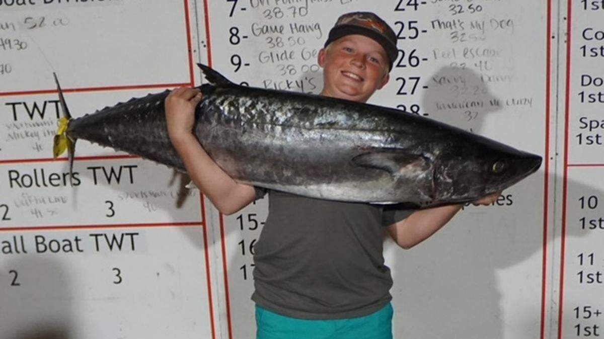 Twelve-year-old Brayden McMullan shows off the winning 52-pound king mackerel during the Freeman/Yamaha Fall Brawl King Classic last weekend out of Ocean Isle Fishing Center.