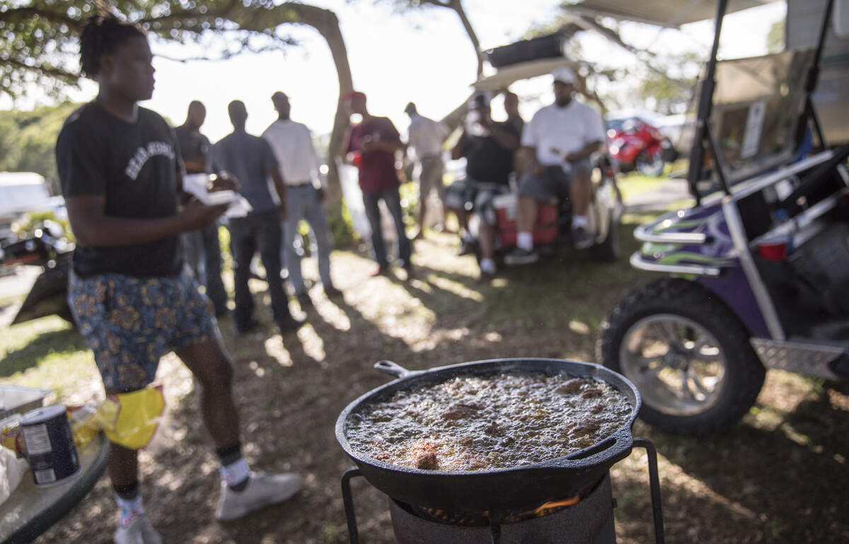 James Freeman sits outside his camper in Atlantic Beach. Atlantic Beach Bikefest gets underway on Friday afternoon with bikers streaming into the Grand Strand's historical black beach. Families camp in the surrounding neighborhood watching the traffic and vendors sell their wares on the streets. Friday, May 25, 2018.