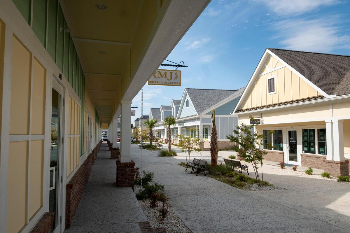 The Shops on Main shopping center on Main Street in North Myrtle Beach has 31 businesses in seven cottage-style buildings and more than 200 parking spaces on a six-acre piece of land. The center has retail businesses, services and restaurants.April 14, 2021.