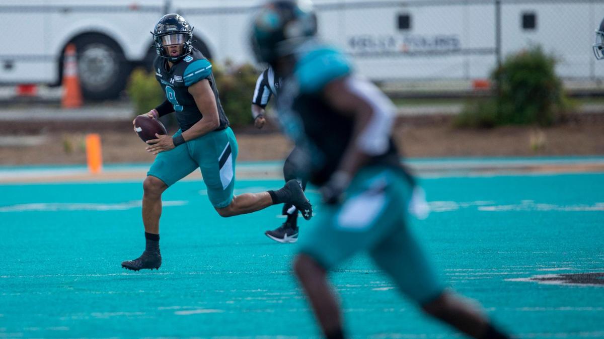 Coastal’s Fred Payton looks downfield for a receiver. Coastal Carolina played its first game as a ranked FBS team against Georgia Southern on Saturday at Brooks Stadium in Conway. October 24, 2020.