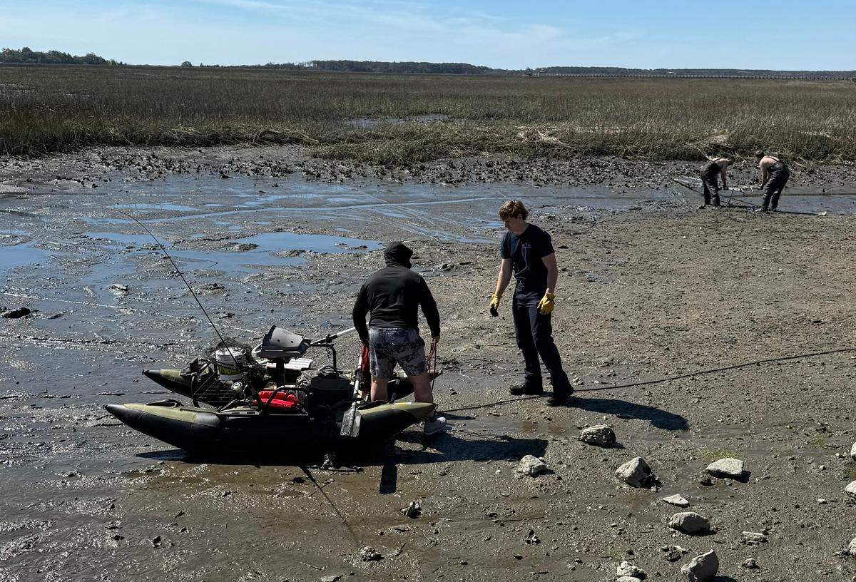 Boater stuck in pluff mud in Murrells Inlet got pulled out by the Murrells Inlet-Garden City Fire Department.