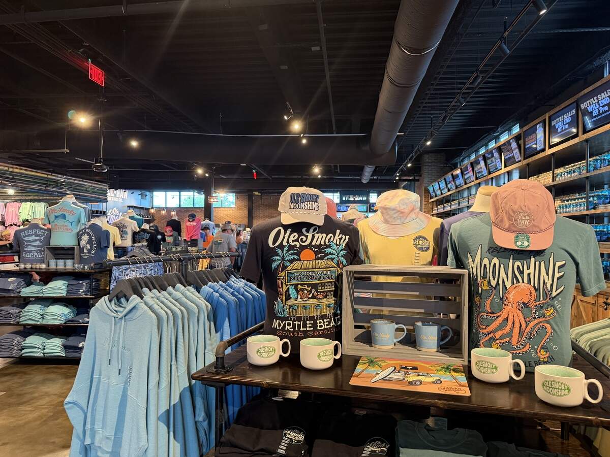 Ole Smoky Distillery and Yee-Haw Brewing Co. sell merch including T-shirts, shot glasses and stickers themed around moonshine and other spirits.