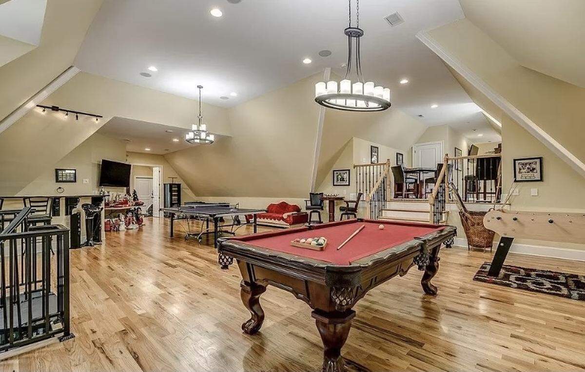 An expensive home is for sale in Pawleys Island, SC. The house is listed on Zillow for $2.9 million. It features a spacious outdoor area with a pool and cabana.