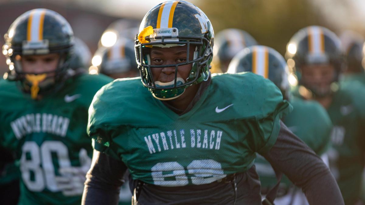 Myrtle Beach Seahawks senior defensive lineman J.B. Favorite leads his teammates onto the field before the start of practice Wednesday at Doug Shaw Memorial Stadium in Myrtle Beach. The Seahawks will travel to Williams-Brice Stadium in Columbia on Friday to face Greer for the Class 4A state championship at 1 p.m.