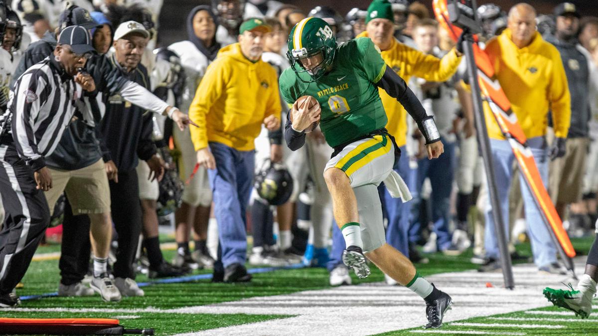 Myrtle Beach junior quarterback Luke Doty scrambles against the Marlboro County Bulldogs Friday night at Doug Shaw Memorial Stadium.