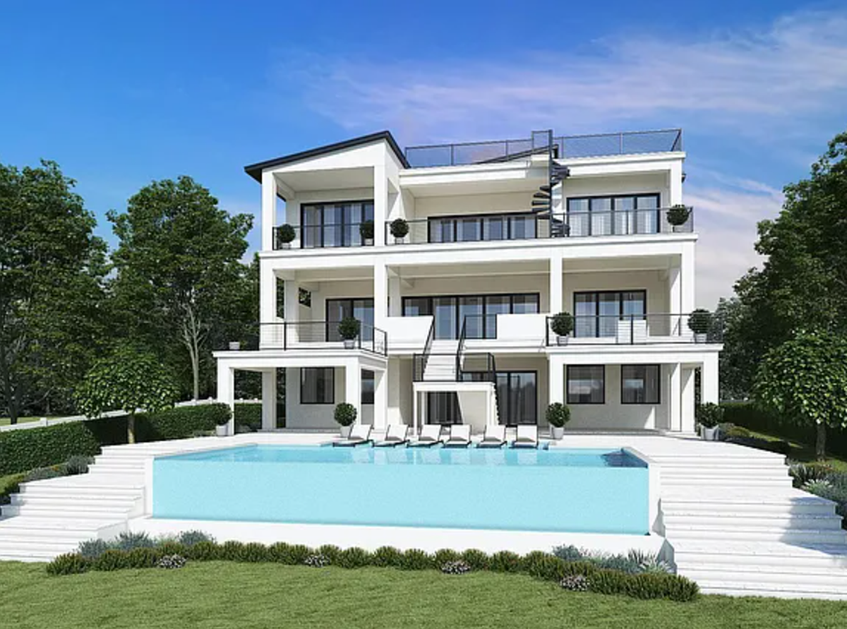 The home, located at 4304 North Ocean Boulevard, features balconies, porches, and a private pool.