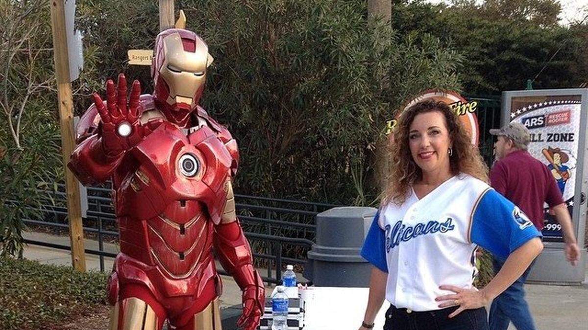 Liz Callaway works a promotion during a Myrtle Beach Pelicans baseball game.