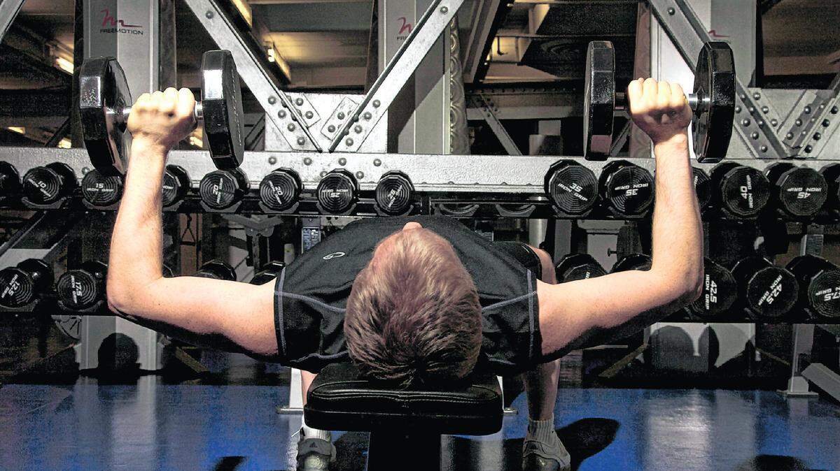  Photo illustration of person working out in a gym.