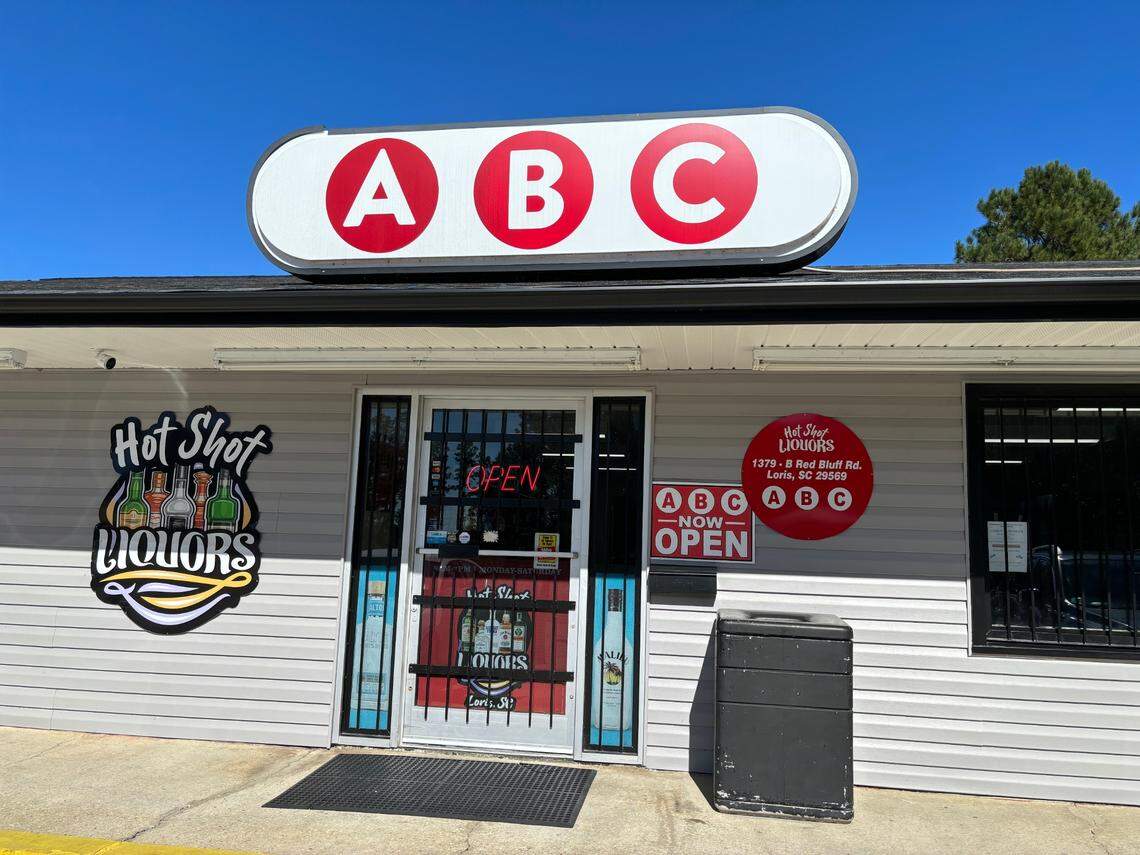 Hot Shot Liquors in Loris. Liquor stores around South Carolina have signs with red dots. This practice dates back to the 1940s. Oct. 21, 2023.