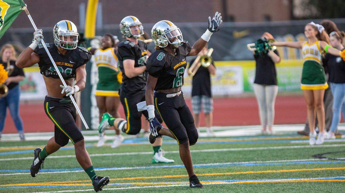 Myrtle Beach senior wide receiver Marcus Grissett runs onto the field before the Seahawks’ game against the Socastee Braves at Doug Shaw Memorial Stadium earlier this season. The Seahawks travel to Hartsville on Thursday in a battle of undefeated teams.