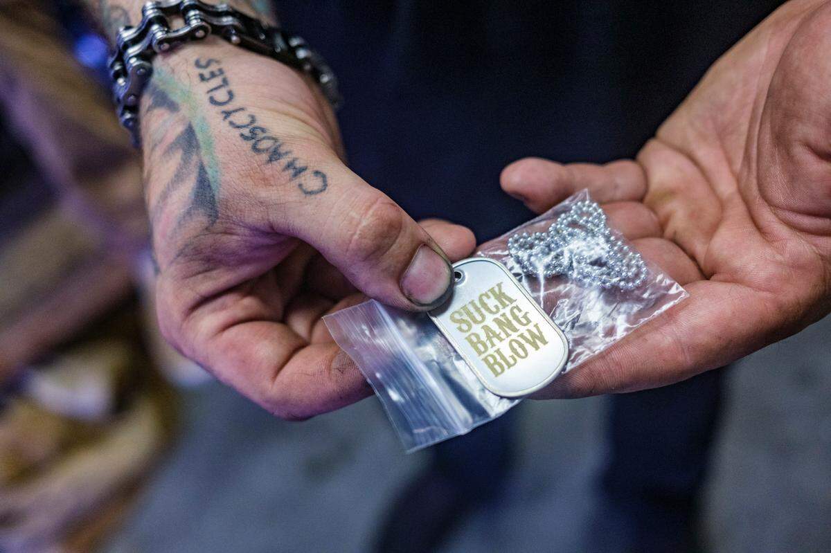 Bikers who shred their tires in the burnout pit at Suck Bang Blow bar in Murrells Inlet, S.C. receive a medallion to commemorate the accomplishment. May 16, 2024.