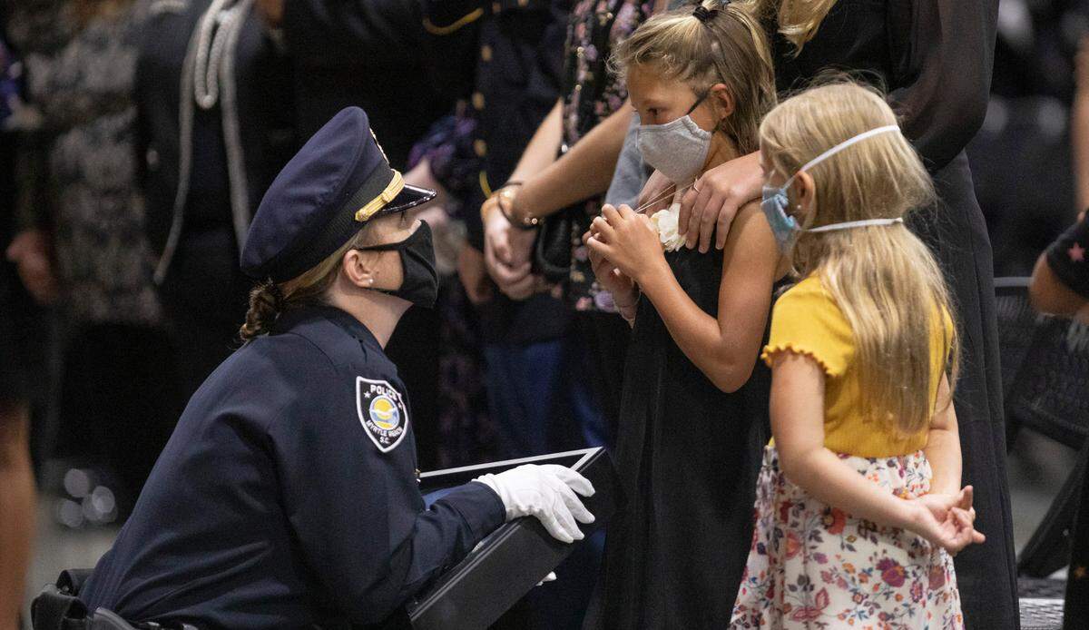 A public funeral service is being held today at the Myrtle Beach Convention Center for Pfc. Jacob Hancher, a Myrtle Beach police officer who was shot and killed earlier this week while responding to a domestic call. Police and first responders from around the region came to pay their respects. October 9, 2020.