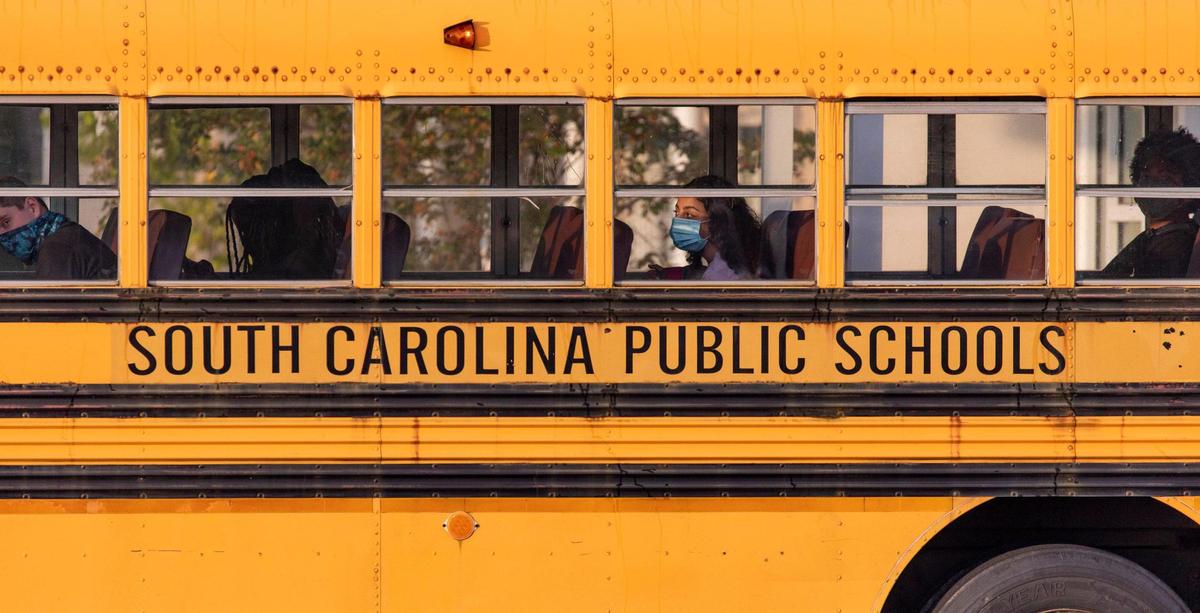 Students arrive at Ten Oaks Middle School on buses Tuesday. About 400 students reported to Ten Oaks Middle School today for their first in-person classes in almost six months since the pandemic. Horry County students returned to school today under a hybrid learning plan that splits students into two groups with each group attending in-person classes two days per week. September 7, 2020.