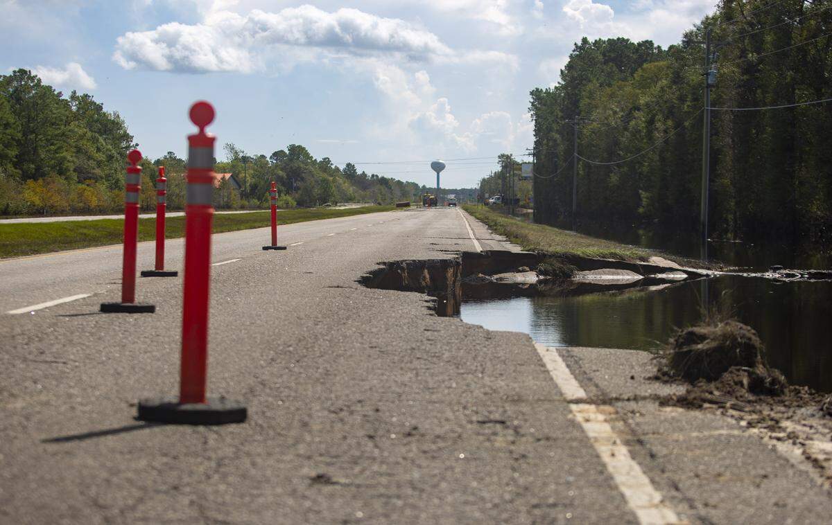 A portion of the eastbound lane of Hwy. 9 in Longs has been washed away after the effects from the flooding of Hurricane Florence. The road remains closed and mostly inaccessible after the effects from the flooding of Hurricane Florence.