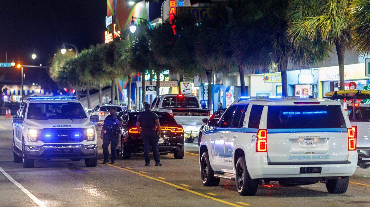 Myrtle Beach Police officers along Ocean Boulevard in Myrtle Beach on Friday, May 30, 2025. Police will be present throughout Fourth of July celebrations while new curfew rules are in place. TSN 2025 File.