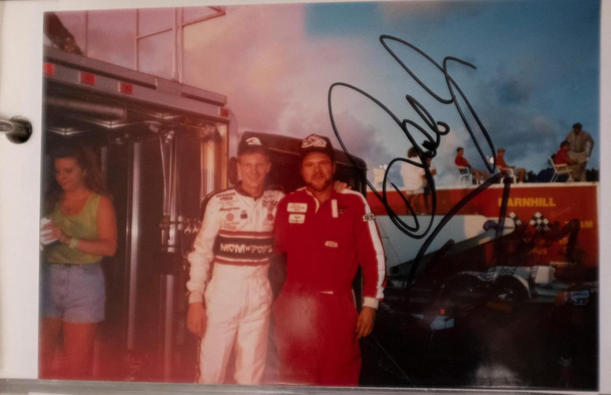 In a picture from his scrapbook, Georgetown resident Eric Joyer poses with champion Dale Earnhardt Jr. at Myrtle Beach Speedway. As the Myrtle Beach Speedway prepares to hold it’s last race, local drivers are readying their cars and reminiscing about their days at the track. August 12, 2020.